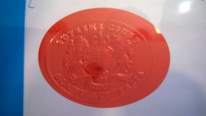 Modern example of a red seal used to indicate a Grant of Probate in South Australia.  It is used in conjunction with an embossing technique.